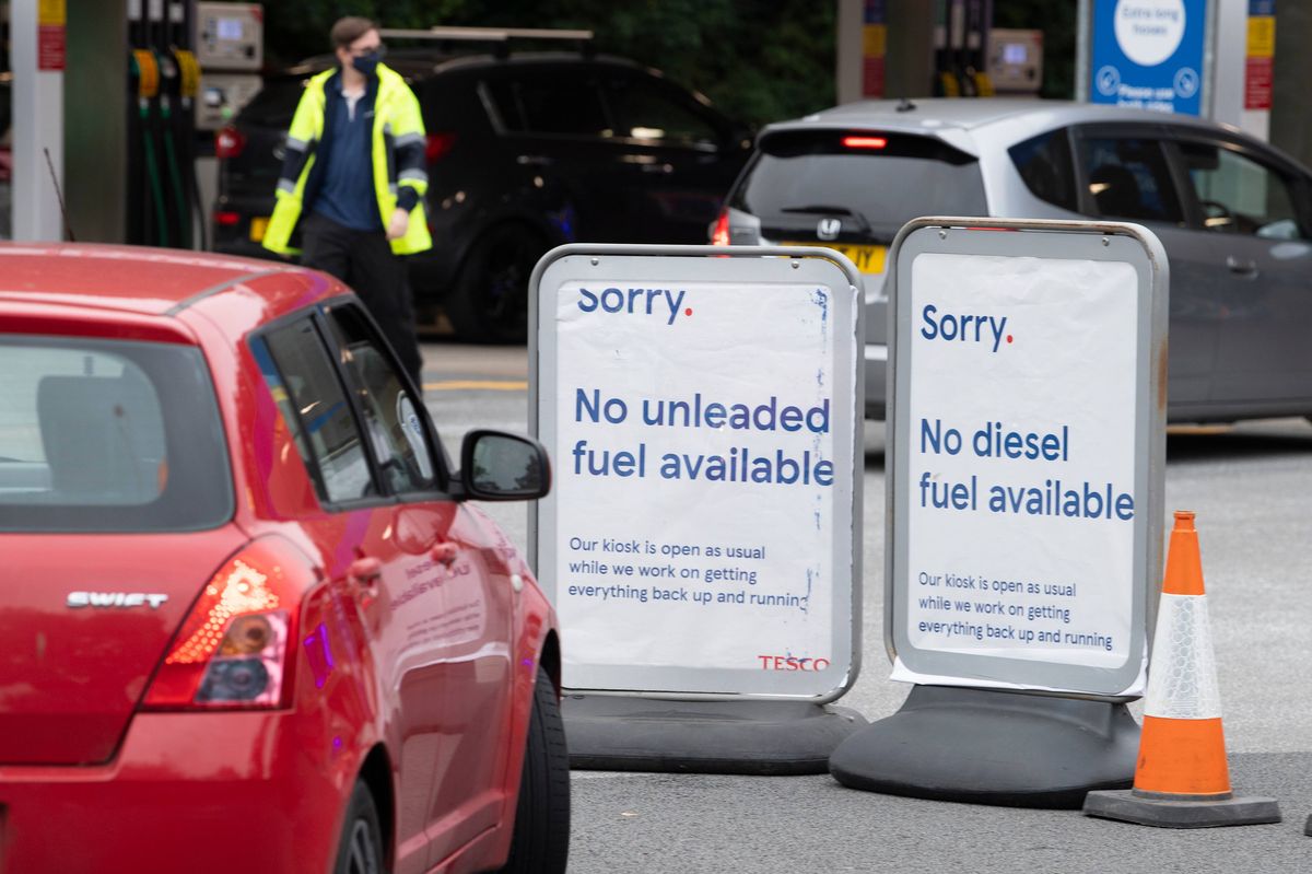 CARDIFF, WALES - SEPTEMBER 24: Signs at a Tesco Extra petrol station off Western Avenue which has run out of unleaded and diesel fuel but still has supplies of super unleaded fuel for sale on September 24, 2021 in Cardiff, Wales. BP and Esso have announced that its ability to transport fuel from refineries to its branded petrol station forecourts is being impacted by the ongoing shortage of HGV drivers and as a result, it will be rationing deliveries to ensure continuity of supply. (Photo by Matthew Horwood/Getty Images)
