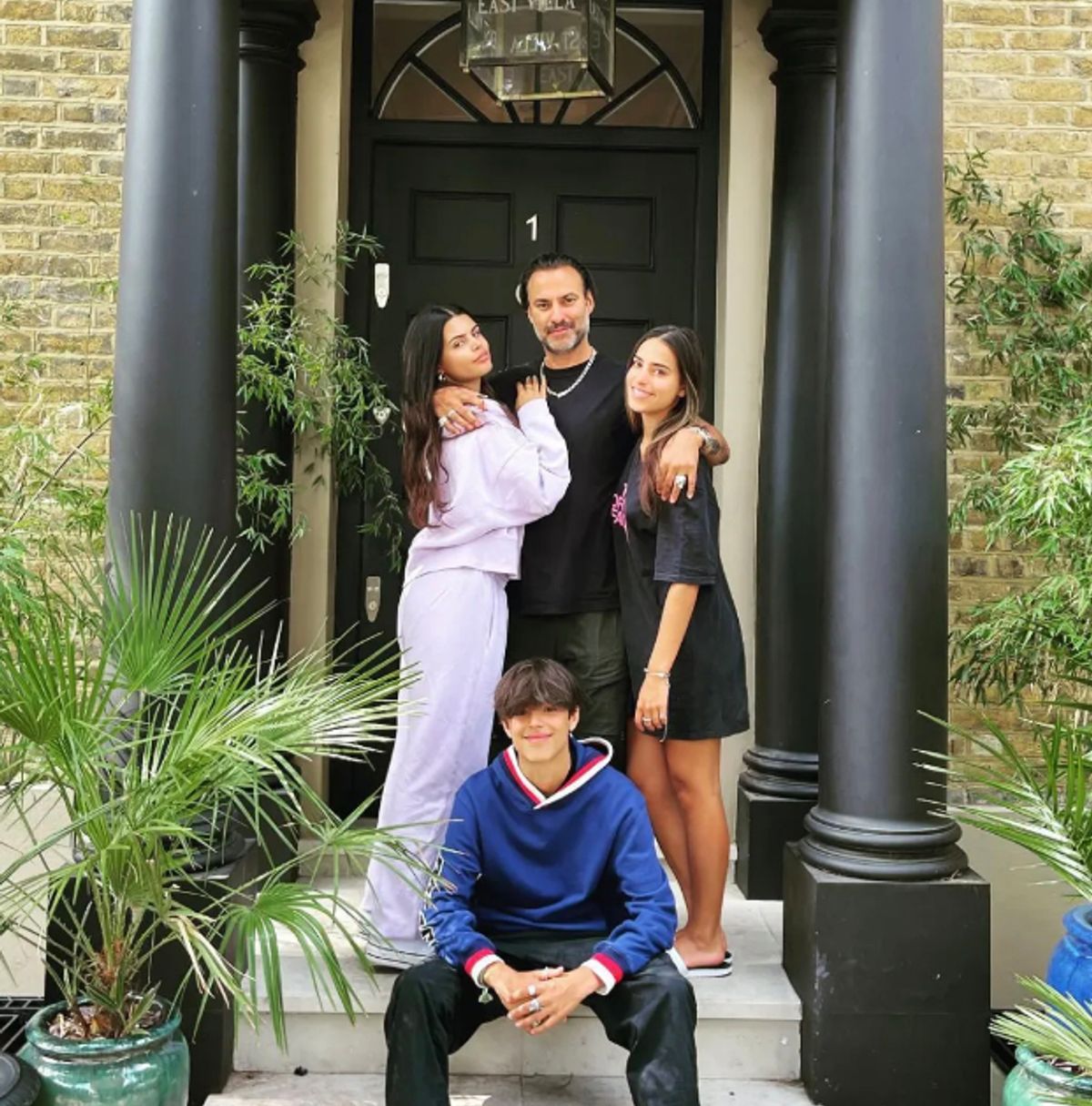 Issy and her siblings with their dad