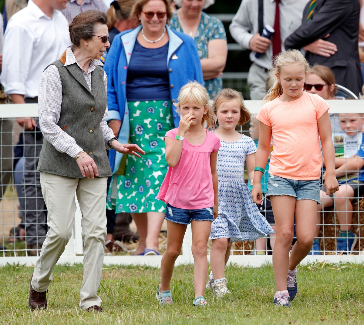 Mia in 2019 with grandmother Princess Anne and her cousins Savannah and Isla
