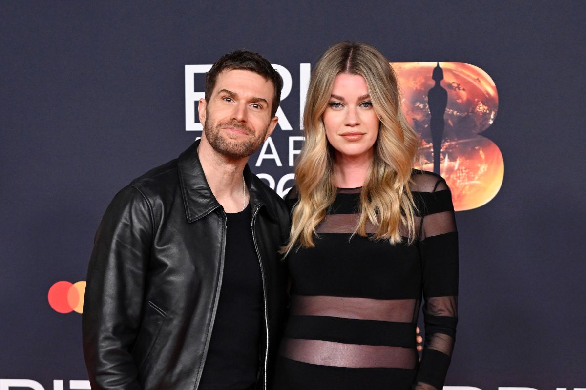 hannah and joel dommett in black on red carpet at brits