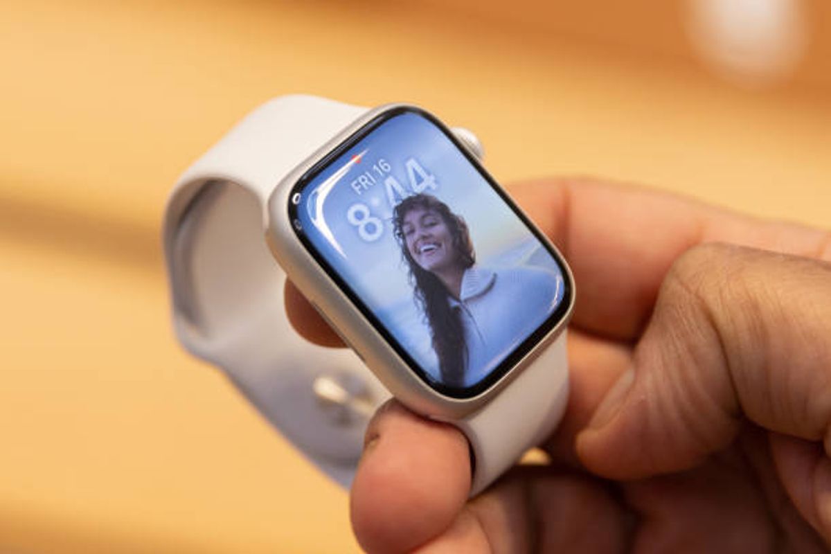 A shopper holds an Apple Watch Series 8 on sale at the company's Fifth Avenue store in New York, US, on Friday, Sept. 16, 2022.
