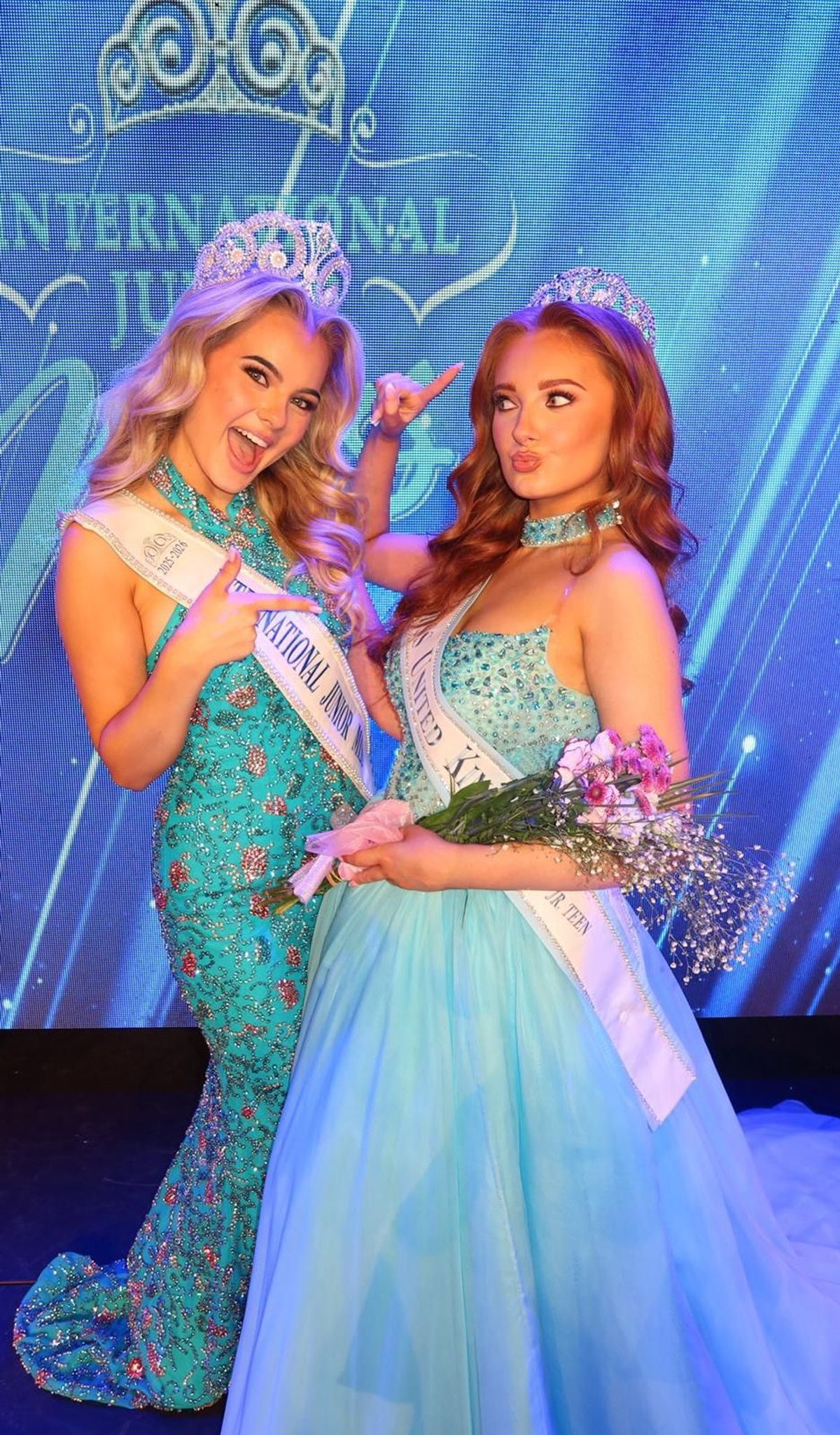 17/04/26 - Emily Taylor, 16, of Grimsby, pictured right, won the title of international Junior Miss United Kingdom Jr Teen and is going to Florida to represent the UK. She is seen with Millie Mae Robinson, who holds the IJM International Teen title