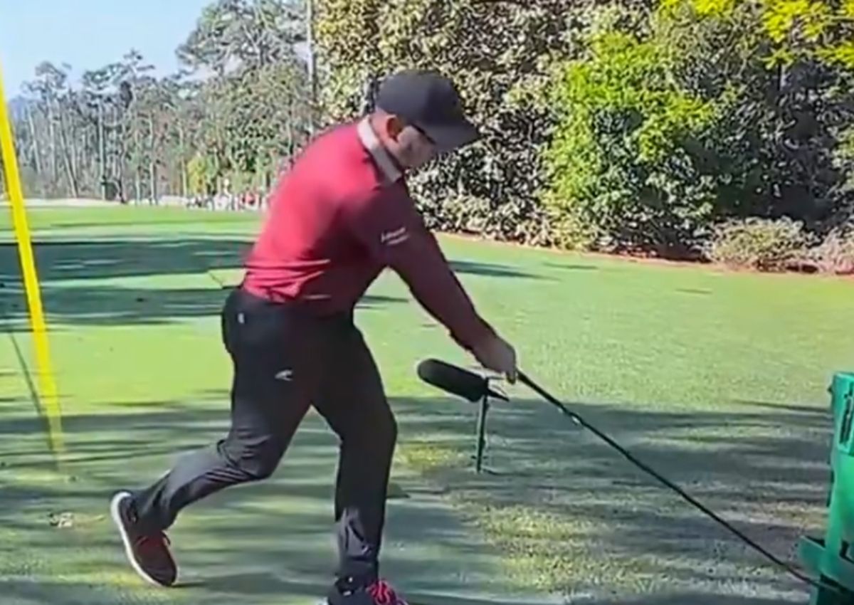 Sergio Garcia hits his driver against a water cooler