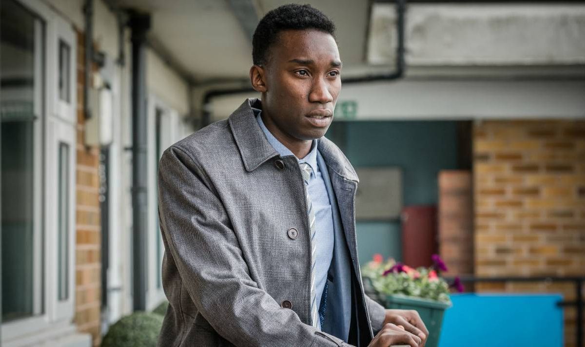 A man in a suit.