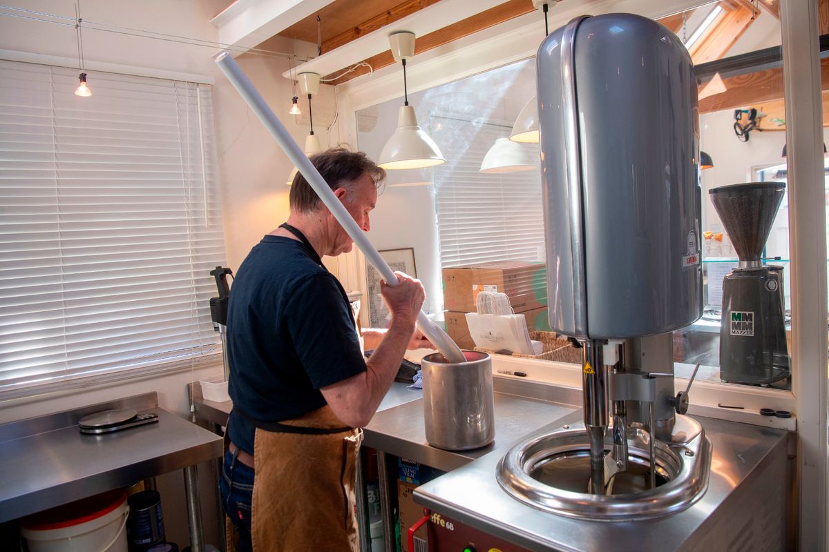 Gareth making the next batch of gelato inside his former garage as part of a feature on Il Gelataio Ice Cream and Gareth Church, Llanishen, Cardiff, who makes and sells ice cream from his converted garage.