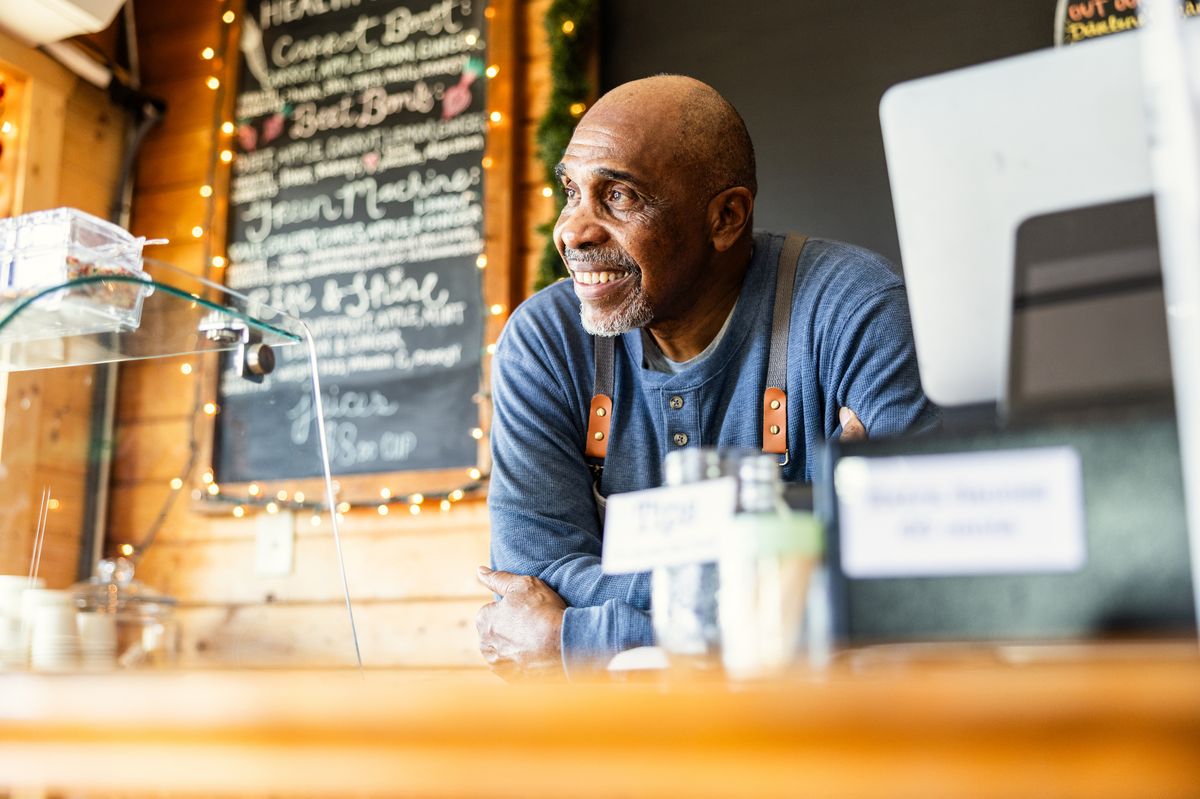 senior worker at a cafe