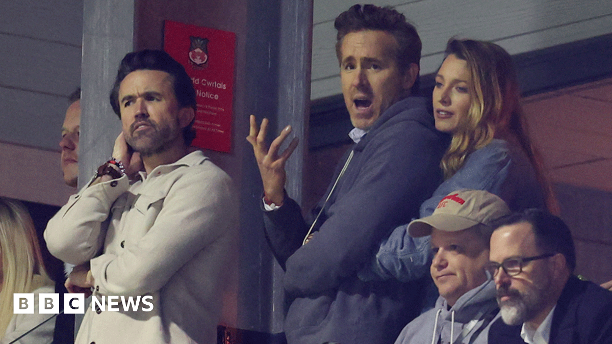 Pained expressions on the faces of Rob Mac, Ryan Reynolds and Blake Lively as they watch Wrexham lose to Chelsea in a cup match last month