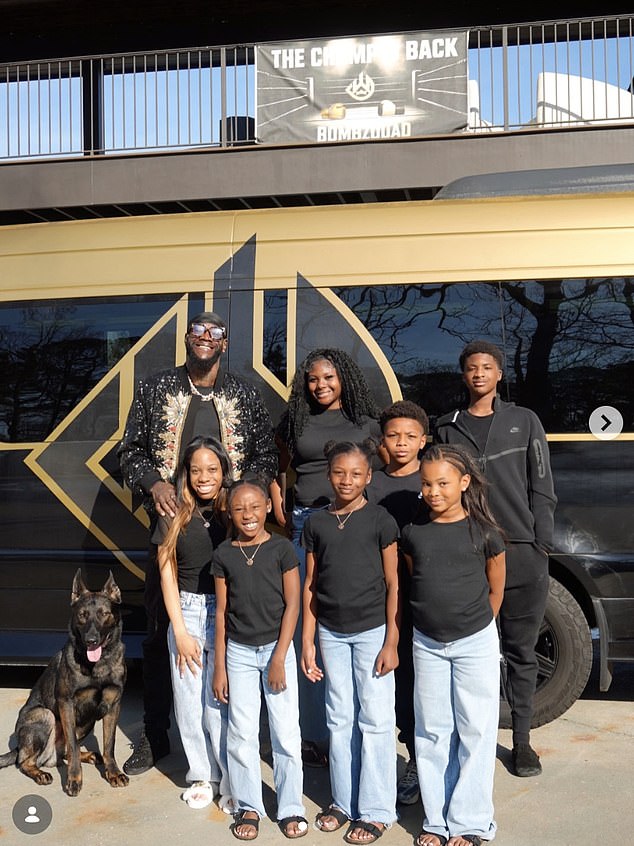 Wilder pictured with seven of his eight children - including first-born daughter, Naieya (centre, back row)