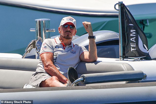 Larry Ellison, founder of Oracle, pictured with Challenger’s Oracle Team USA during the 35th America’s Cup in Bermuda in 2017. The tech giant is slashing jobs while ramping up AI spending