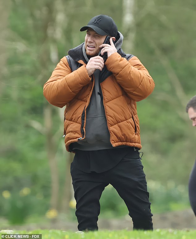 Joe's ring was on as he took a call during the day out celebrating Stacey's neice's birthday