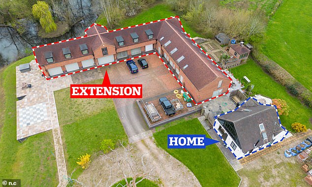 Dr Martin Rooke constructed the vast L-shaped structurewithout planning permission, insisting it was needed to house a collection of classic cars