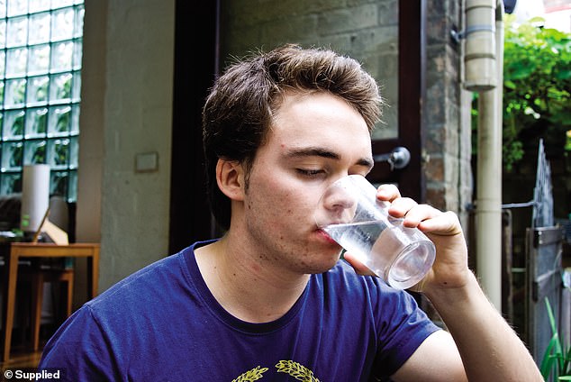 He is pictured as a young adult drinking the sterilised, recycled water from the home