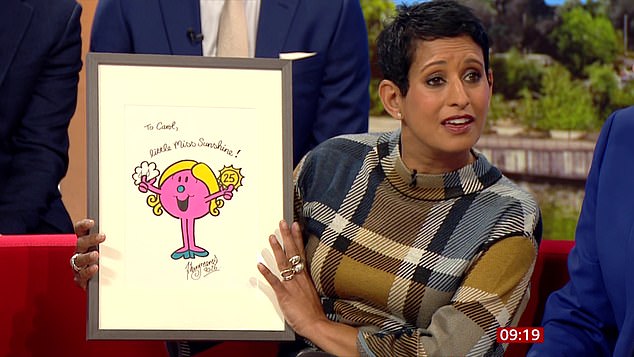She hands Carol a painting of Little Miss Sunshine by Mr Men illustrator Adam Hargreaves, adding: 'Here is a rare glimpse into me being lovely to you'