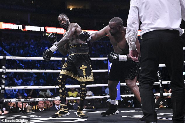 As for the actual heavyweight fight itself, Wilder (left) beat Chisora (centre) by split-decision
