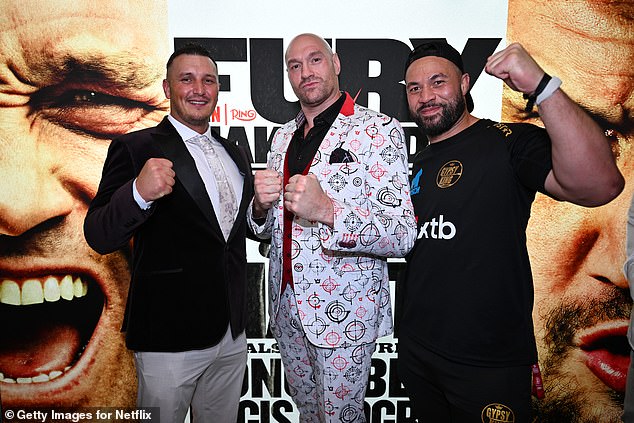 Fury (c) and Parker (right) pictured at Wednesday's grand arrivals in London on fight week