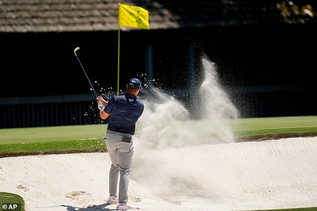 DeChambeau took three attempts to get out of the bunker before ending the hole with a seven