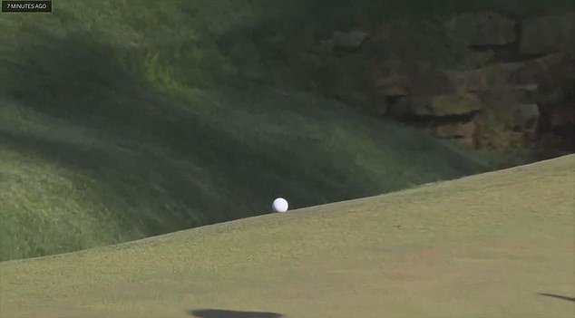 Li unbelievably putted his ball into Rae's Creek from the back of the green at 13