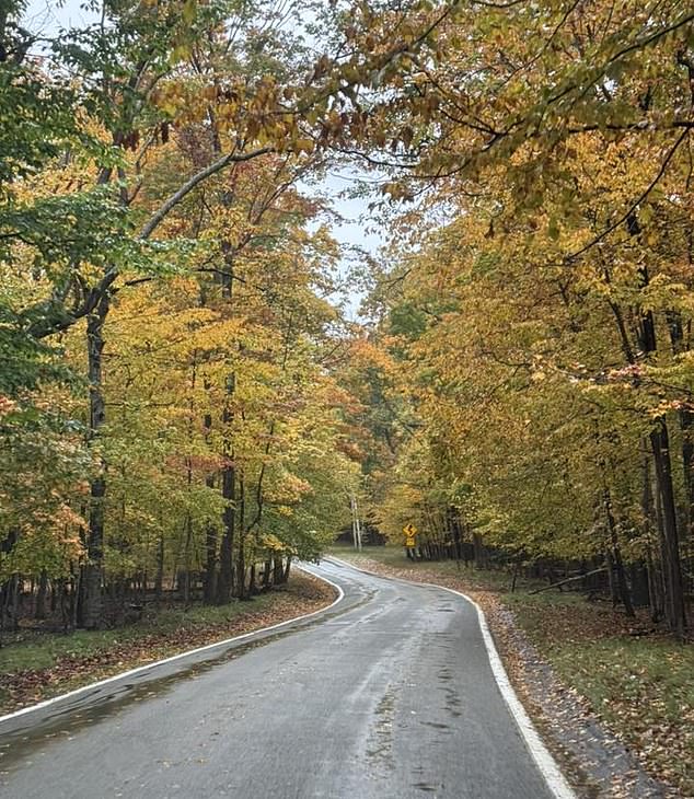 The collapsed roadway has been a popular scenic drive, seen above, in Michigan along a 20-mile stretch of road along Lake Michigan