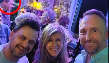 Out and about: Kate Garraway at The Railway Arms with Liam Halligan, circled. The pair were seen 'getting cosy' together