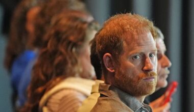 Prince Harry opens up about the 'real struggles' of fatherhood as he reveals he went to therapy as a new dad during emotional talk at AFL club - while Meghan is nowhere to be seen