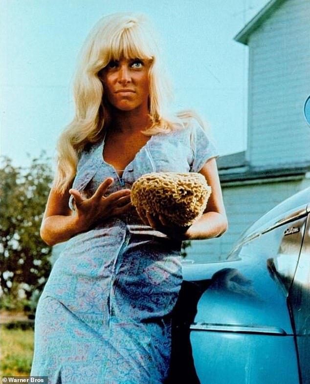 1960s screen icon Joy Harmon, who wowed fans in Cool Hand Luke, has died aged 87 - pictured as car-washer Lucille in the film in 1967