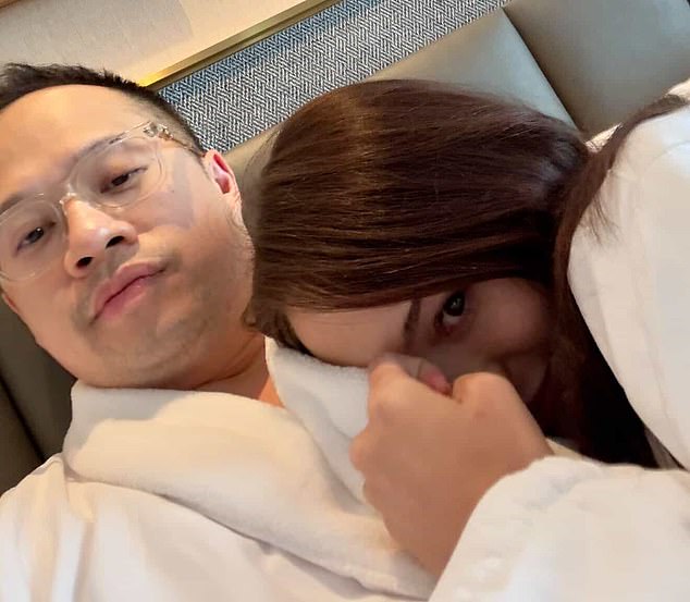 Another image he posted saw Alice cuddling Tong, the pair dressed in matching white robes