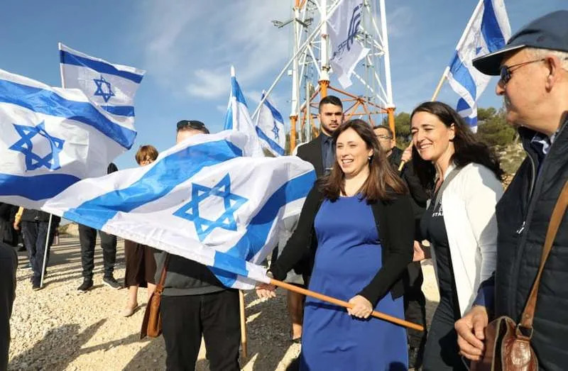 French immigrant Likud supporters and Tzipi Hotovely walk toward The Ari Fuld Lookout during a demonstration march demanding Israeli sovereignty in the West Bank in Oz VeGaon on February 27, 2020. (credit: GERSHON ELINSON/FLASH90)