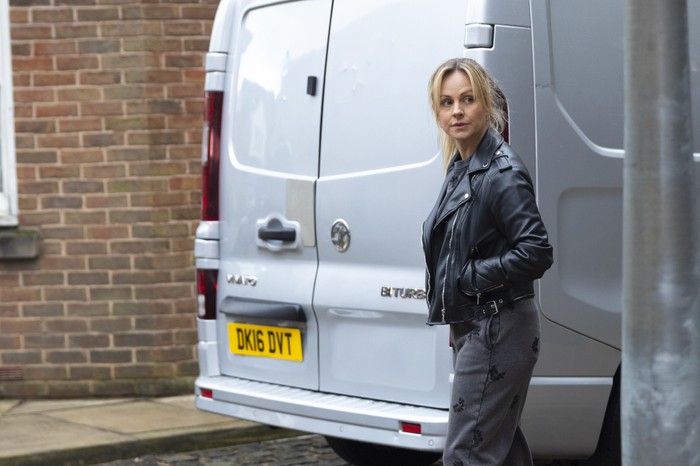 16_04_coro_sarah_01 Sarah stands beside Theo's van in Coronation Street
