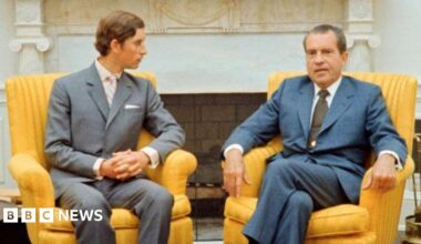 Prince Charles, seen here with his father and sister, took a moment to speak to reporters at New York's Kennedy airport during a stopover on their way back to London after attending the Commonwealth Games in Jamaica