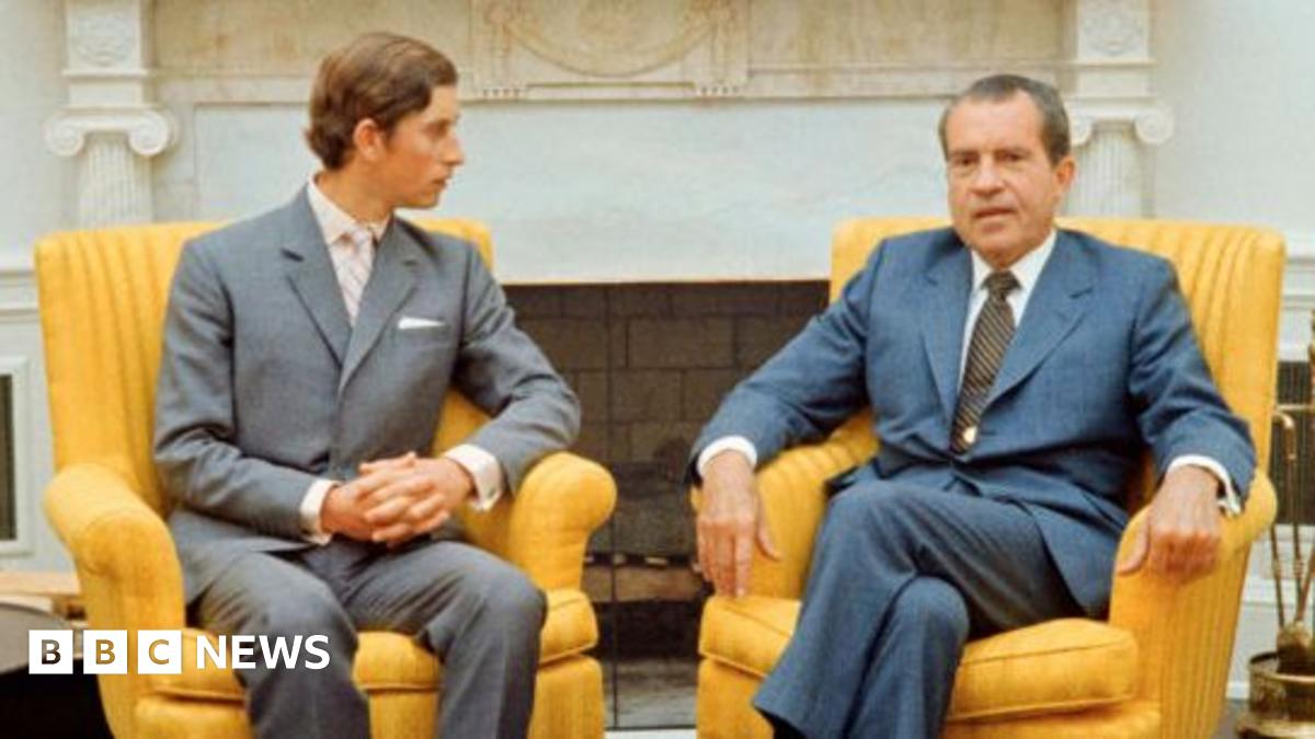 Prince Charles, seen here with his father and sister, took a moment to speak to reporters at New York's Kennedy airport during a stopover on their way back to London after attending the Commonwealth Games in Jamaica