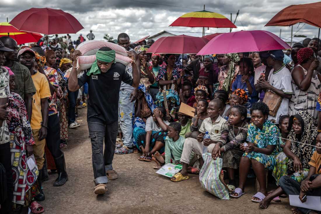 People fleeing violence in the eastern part of the Democratic Republic of Congo cross into Burundi. The U.K. is set to cut aid to Africa by more than half over the next three years.