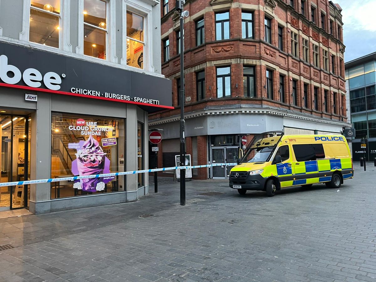 The cordon runs across the bottom of Button Street in Liverpool City Centre