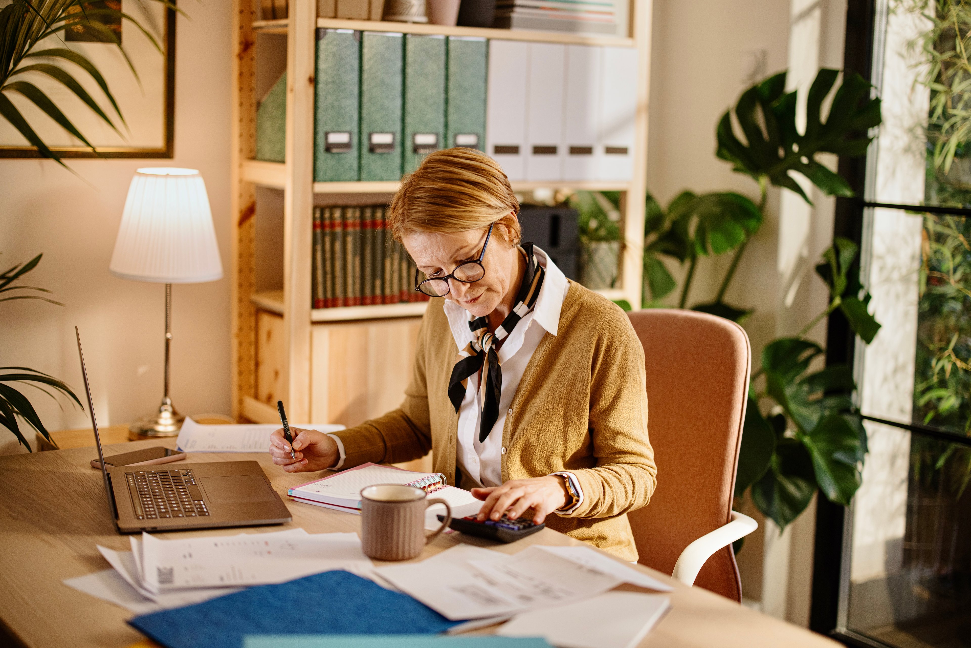 A person at a laptop.