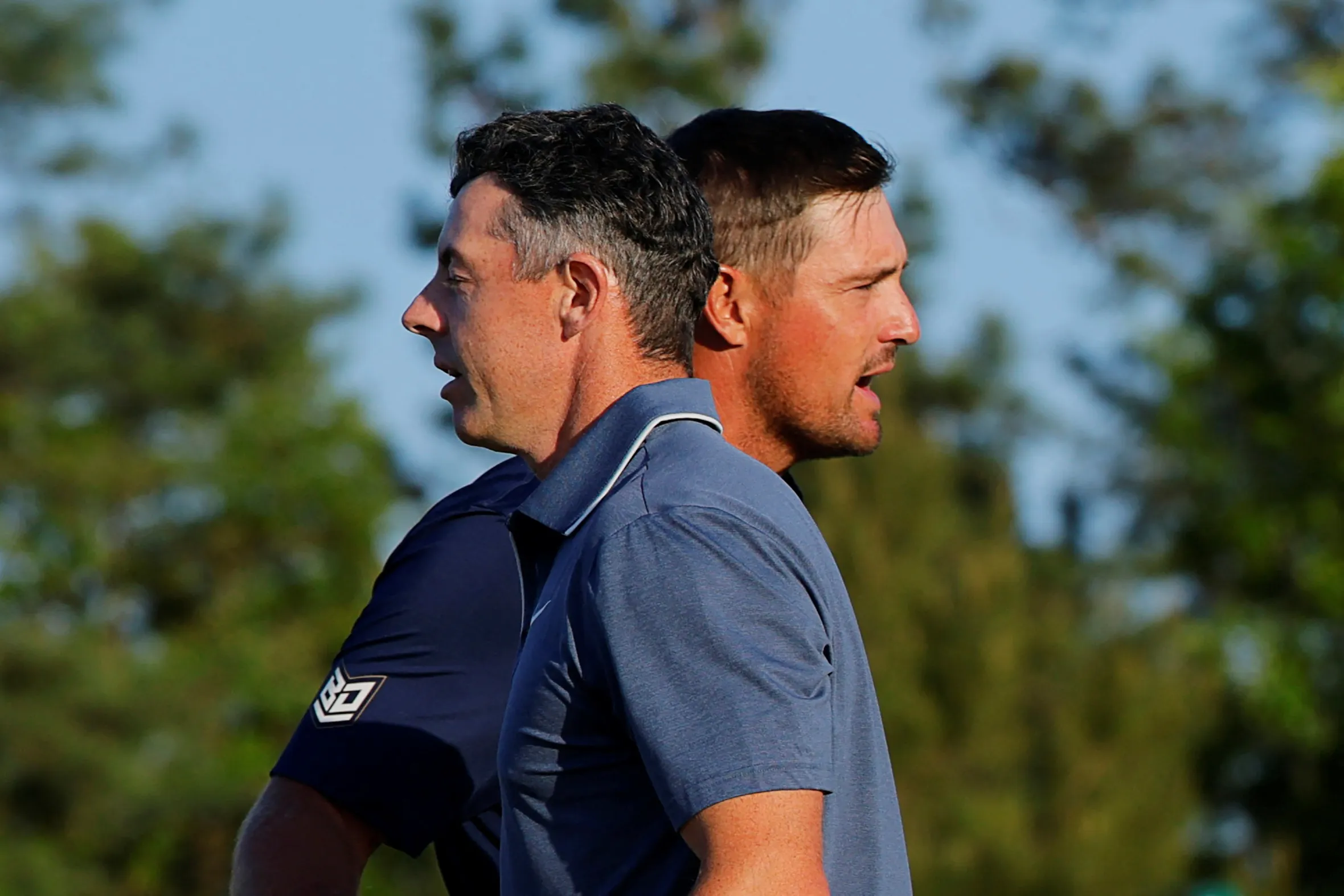Rory McIlroy and Bryson DeChambeau at the Masters Tournament.