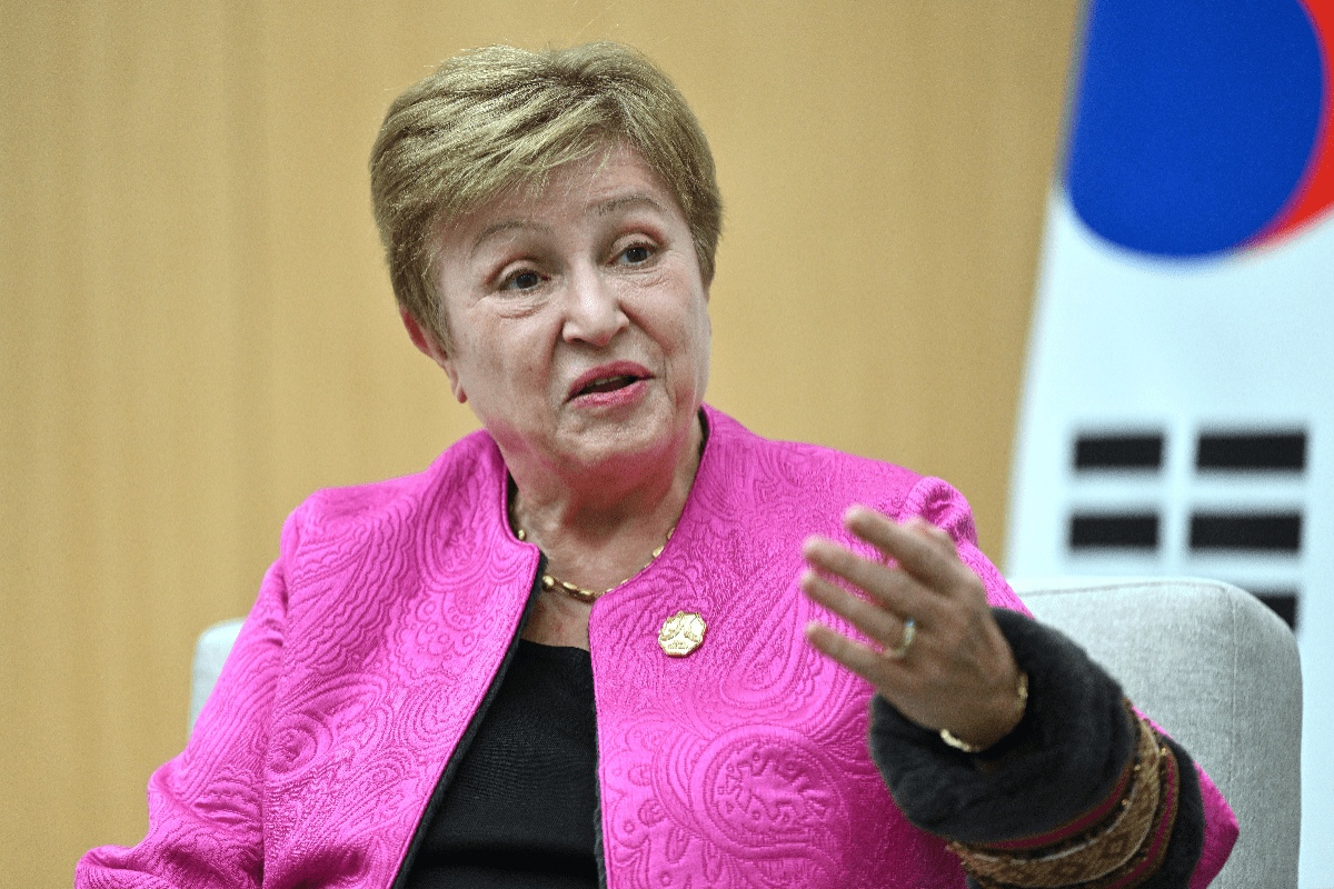 IMF Managing Director Kristalina Georgieva speaking at a press conference, addressing global economic challenges.