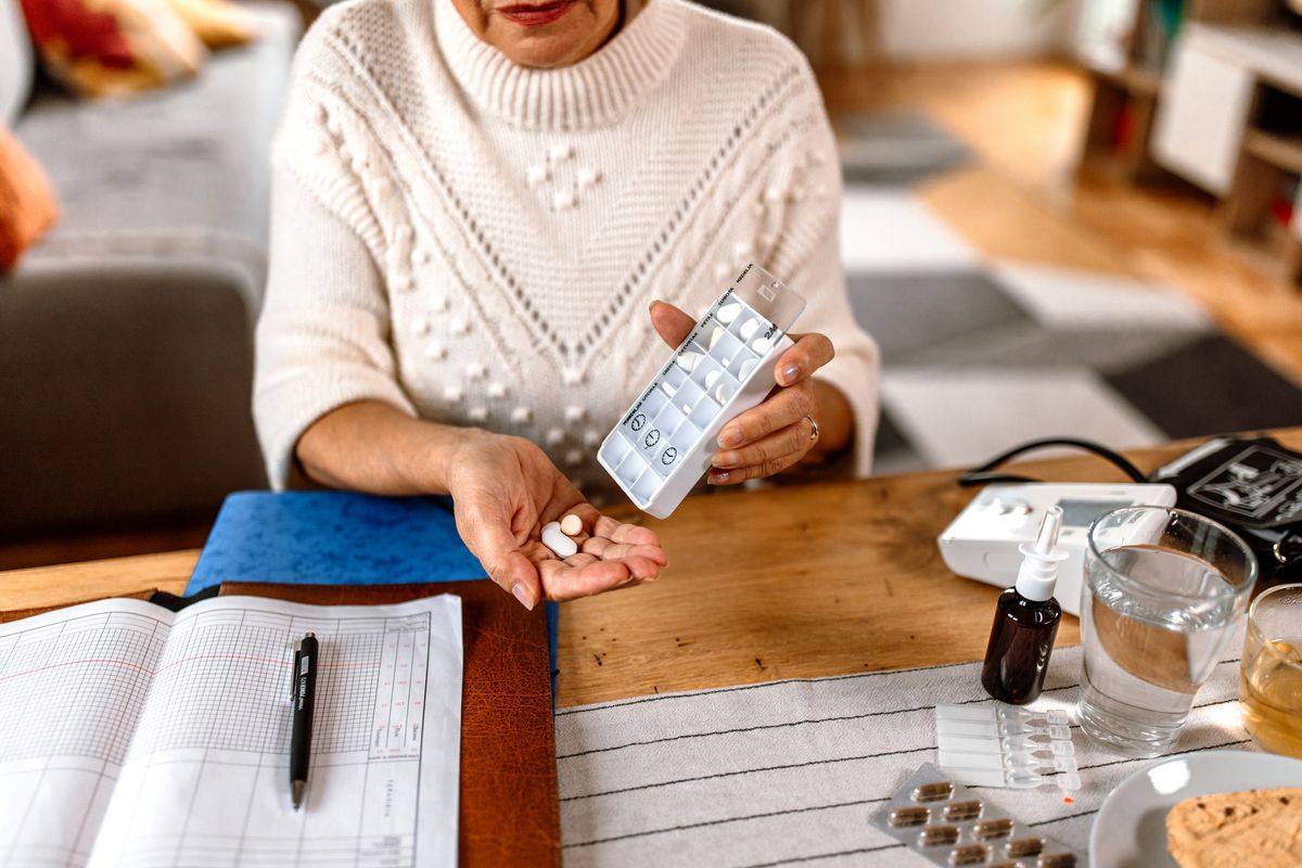 Person taking a pill