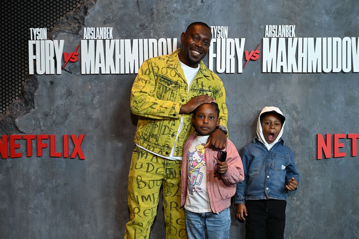 Rapper Dizzie Rascal with his children