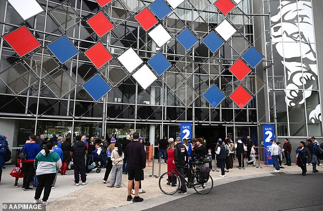 Western Bulldogs supporters wait to enter the ground for a training session as Prince Harry the Duke of Sussex visits with the Movember Foundation at the Western Bulldogs headquarters, Whitten Oval in Melbourne, Wednesday, April 15, 2026. (AAP Image/Joel Carrett) NO ARCHIVING