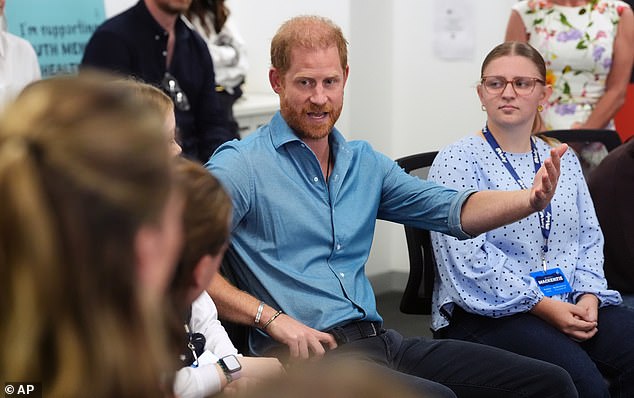 Prince Harry, the Duke of Sussex takes part in discussion group with young advocates during a visit to Batyr, a mental health engagement program at Swinburne University of Technology in Hawthorn, Melbourne, Australia Thursday, April 16, 2026. (Jonathan Brady/Pool Photo via AP)