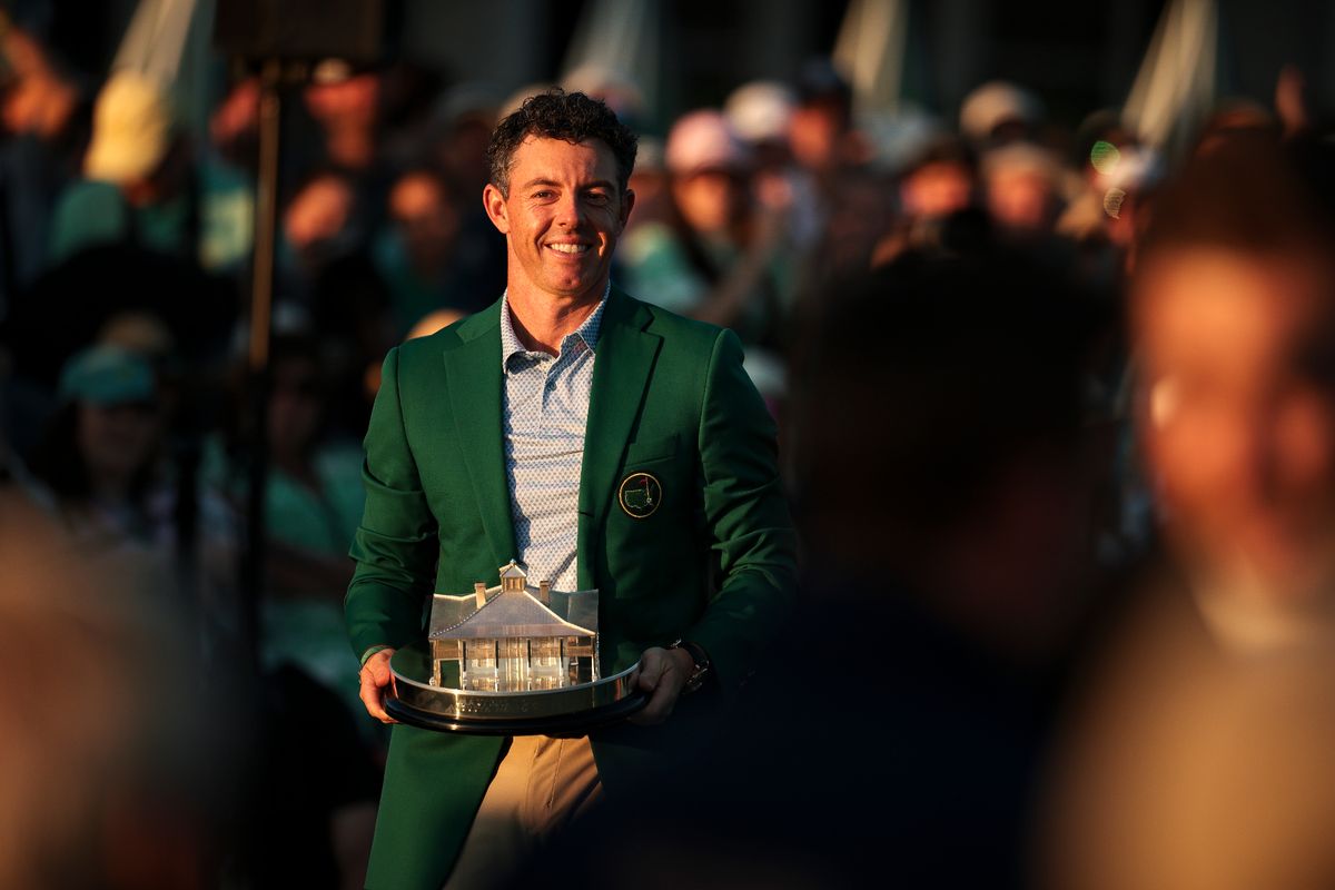 Rory McIlroy poses with the Masters title