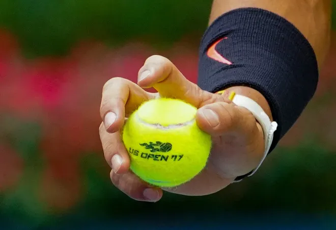 Sept 10, 2017; New York, NY, USA; Detailed view as Rafael Nadal of Spain bounces a tennis ball before serving to Kevin Anderson of South Africa in the Men's Final in Ashe Stadium at the USTA Billie Jean King National Tennis Center.