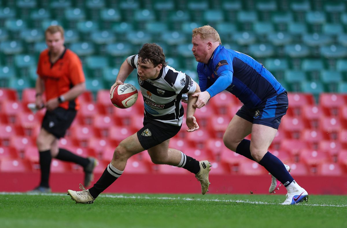 Dafydd Thomas of Tumble races in to score try