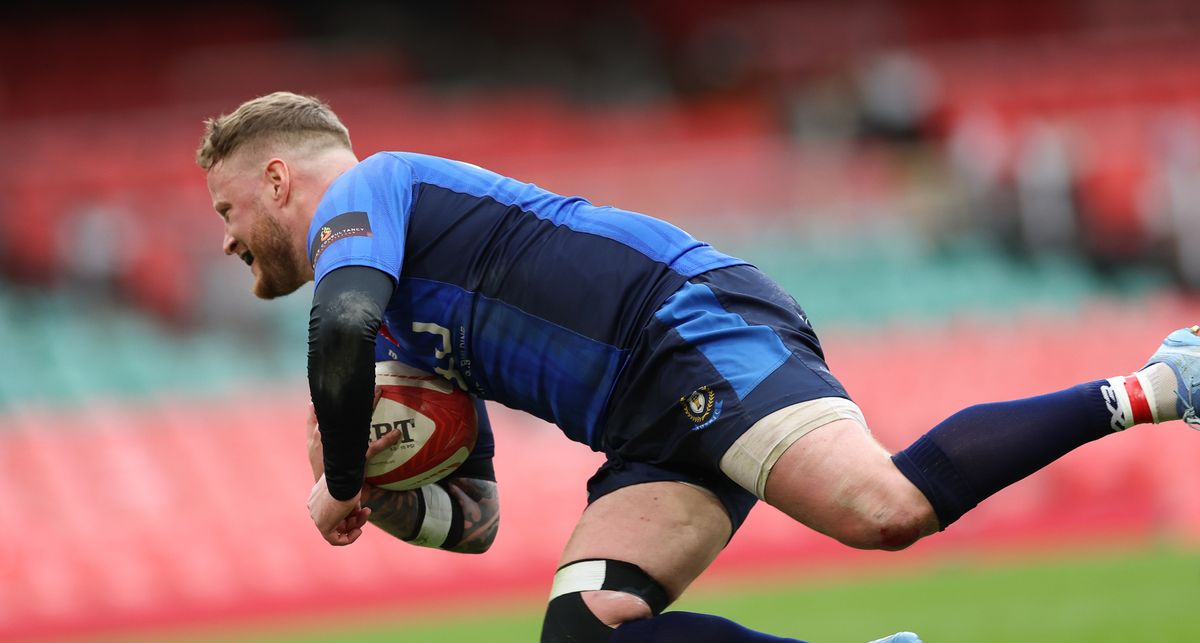Dafydd Daniel of New Dock Stars races in to score try