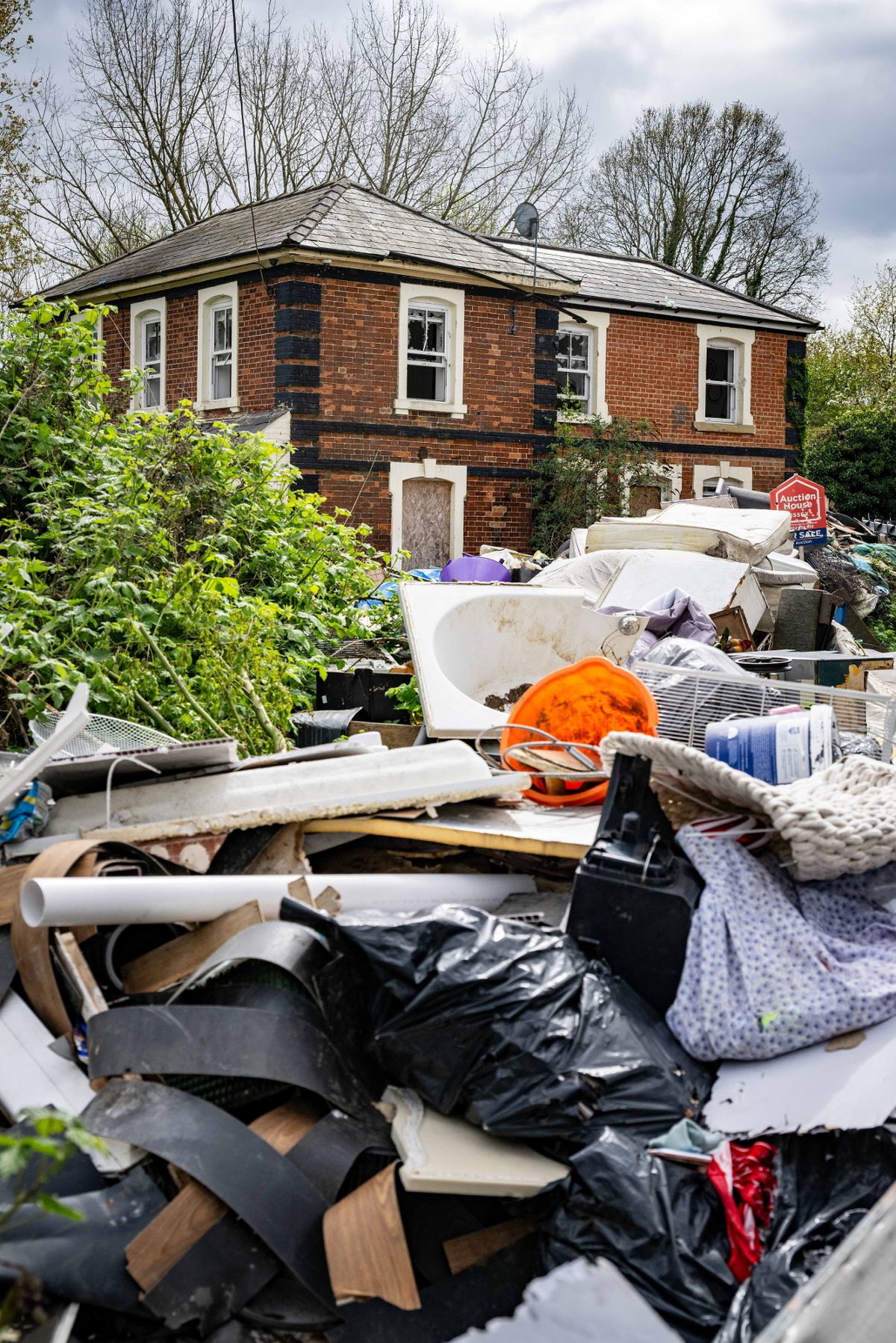 The historic railway station has become overrun by fly tipping