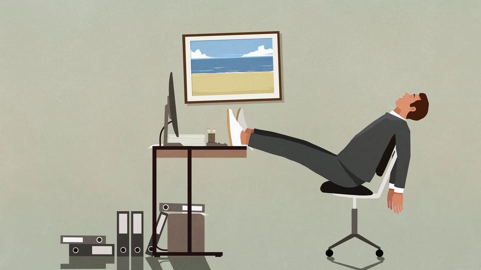 Tired businessman sleeping with feet up on desk