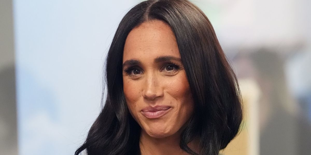 Meghan Markle distances herself from photograph row