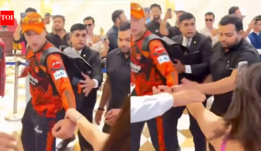 IPL 2026: Shocking! Fangirl forcibly pulls Abhishek Sharma's hand; security steps in - Watch | Cricket News