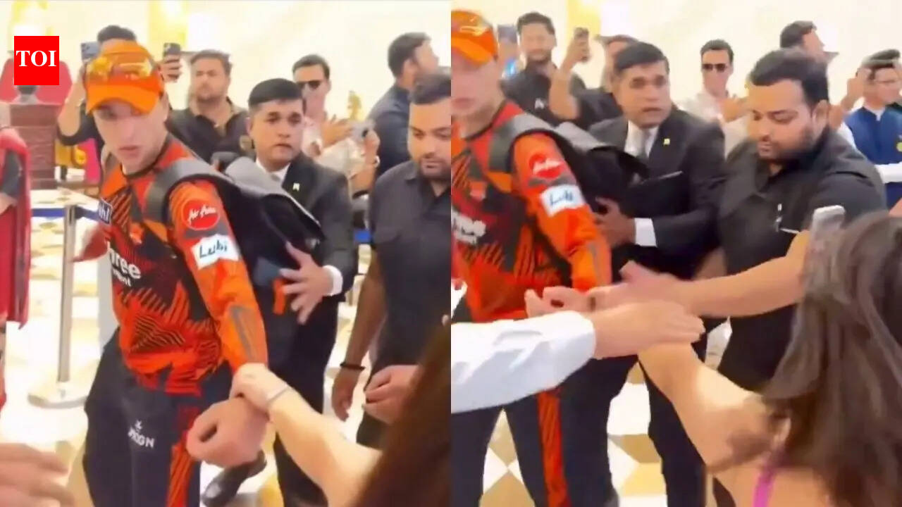 IPL 2026: Shocking! Fangirl forcibly pulls Abhishek Sharma's hand; security steps in - Watch | Cricket News