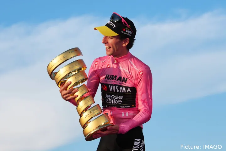 Simon Yates poses with the Giro d'Italia trophy in Rome
