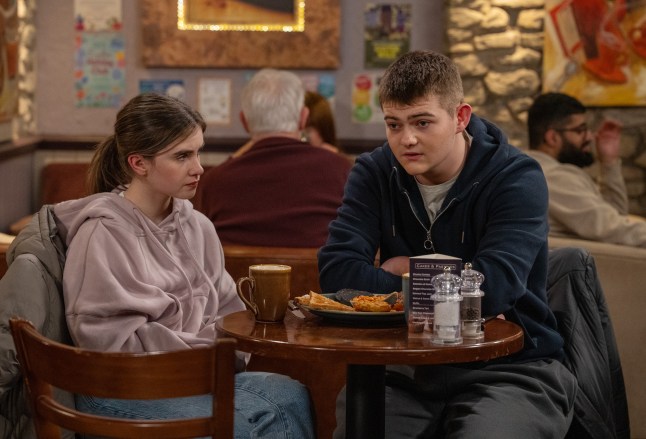 April Windsor chatting to a worried Dylan Penders in the cafe in Emmerdale.